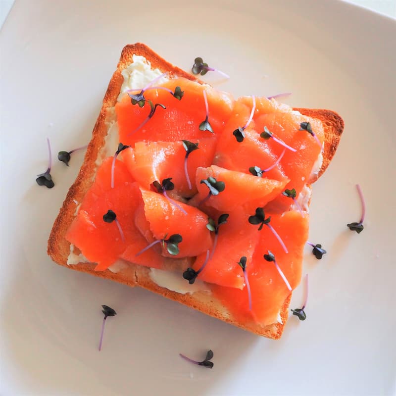 A slice of shokupan with various toppings
